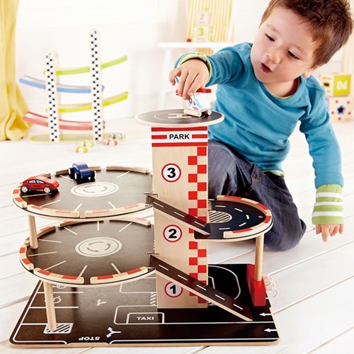 Hape Holzgarage Park & Go - Spielzeug Parkhaus mit Autos